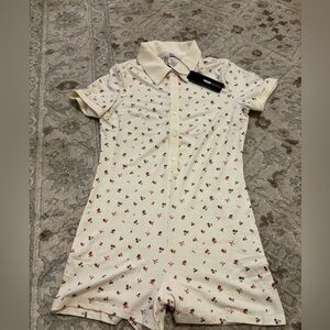 Fashion Nova Cream Romper with Red Floral Accents